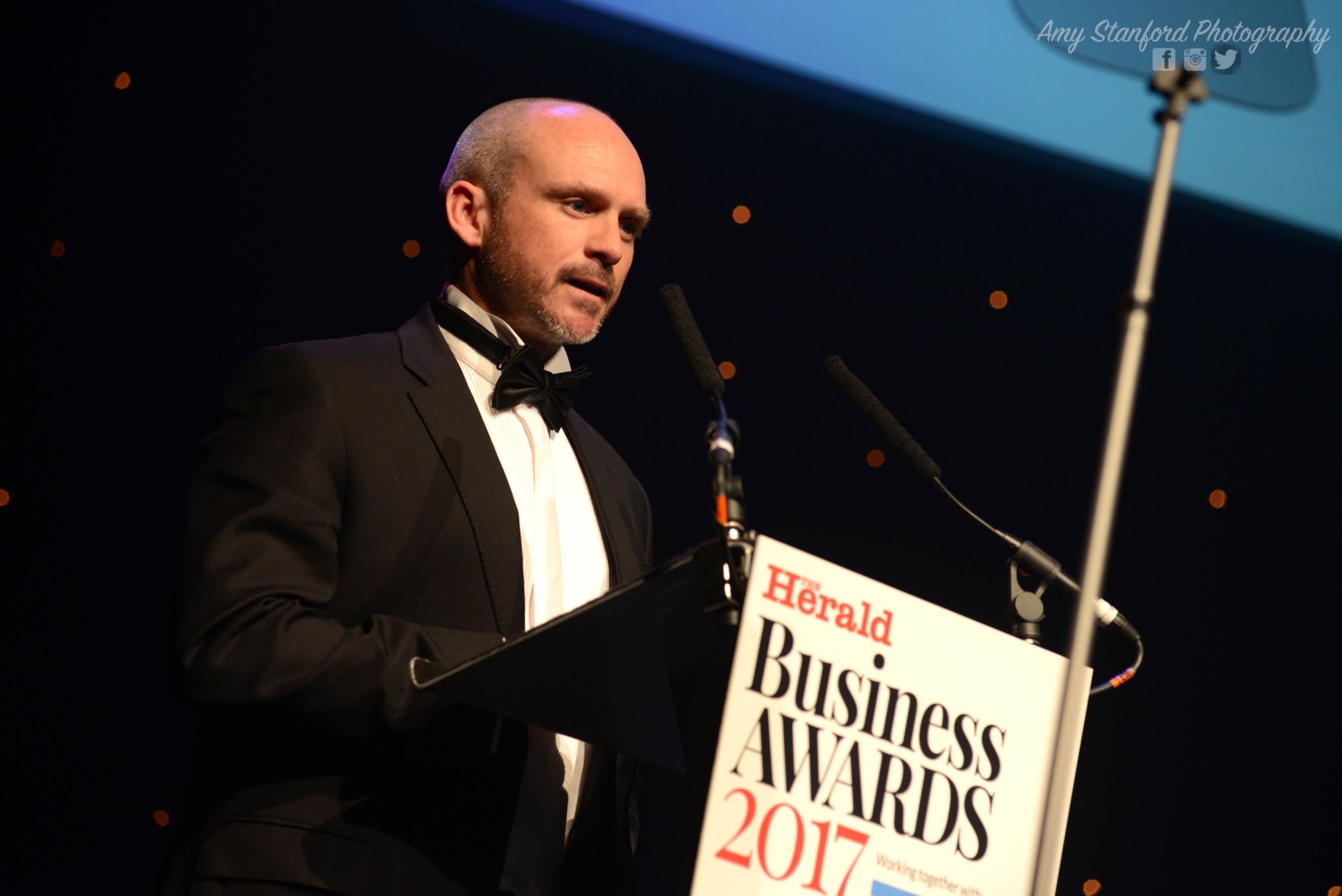 Antony Jinman speaking in black tie at the Herald Business Awards 2017