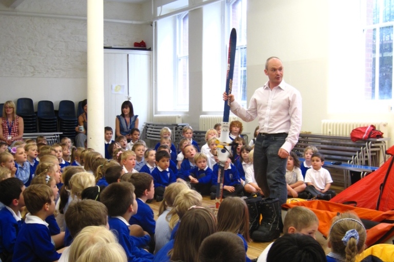 Antony showing polar expedition equipment to primary school pupils